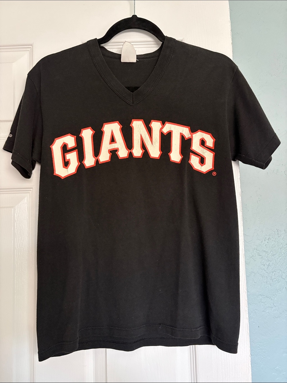 Vintage Majestic Black 'GIANTS' Short Sleeve V-Neck Tee with Orange/White Logo